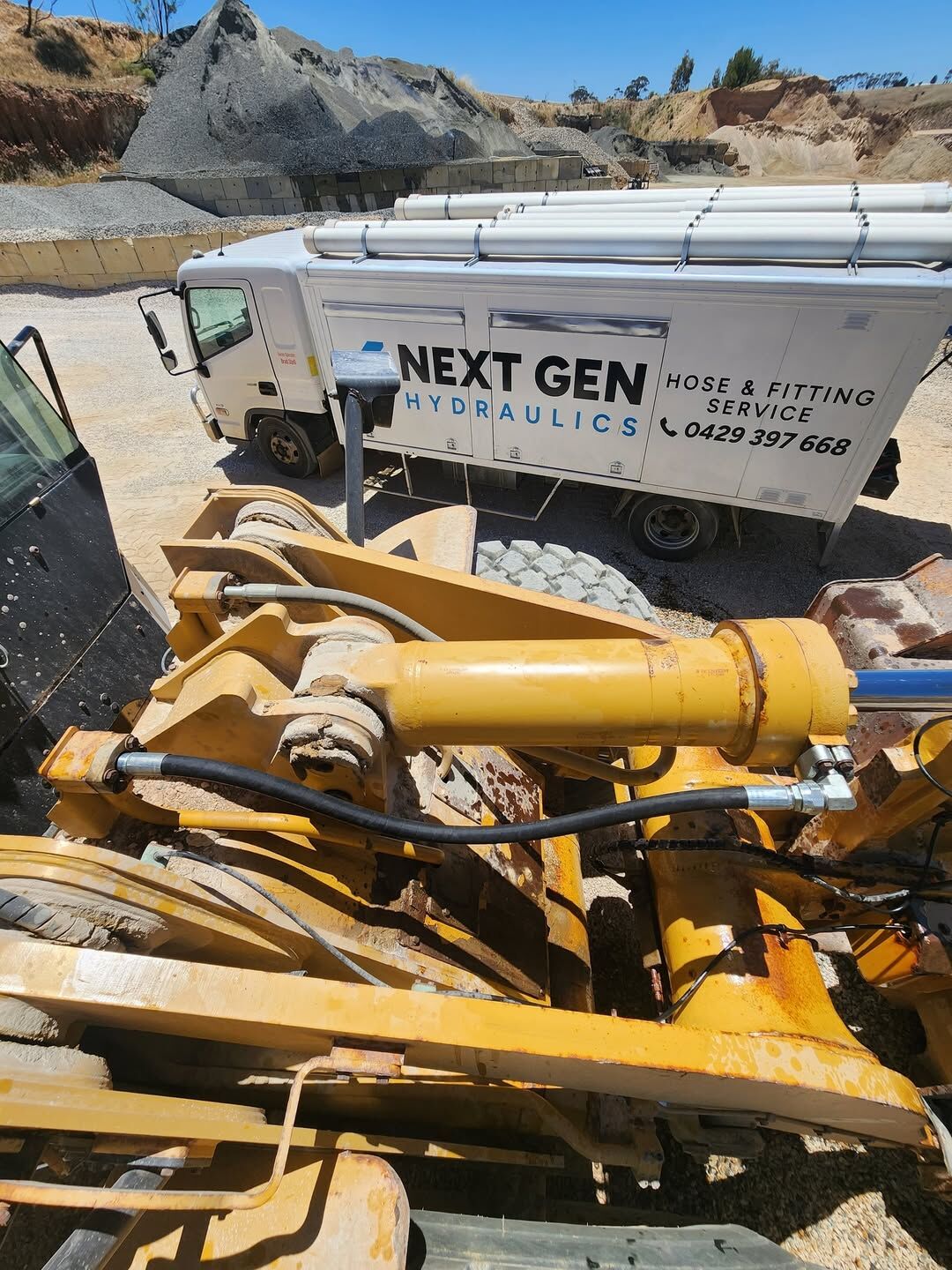 Quarry plant machinery on site near Adelaide during a hydraulic hose repair